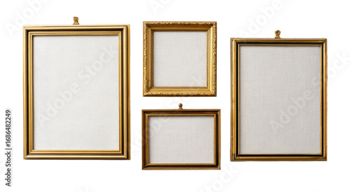 Four gold picture frames, various sizes, on a plain background