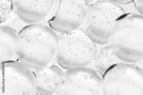 Wall Mural Transparent glass spheres with air bubbles close up, abstract background