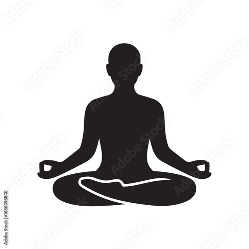 Silhouette of a person meditating in a lotus pose