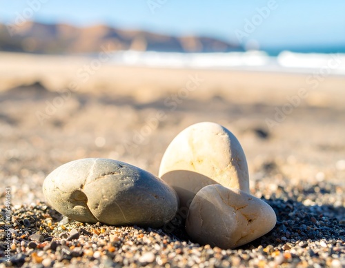 Smooth stones on a sunny beach