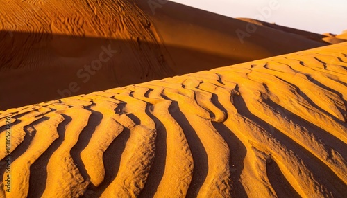 Fototapeta Naklejka Na Ścianę i Meble -  Aerial View of Beige Sand Dunes with Corduroy Ridges