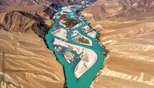 Aerial View of Braided River with Tan and Teal Hues