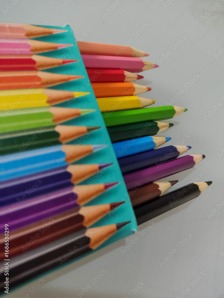 Fototapeta premium colored pencils on white background