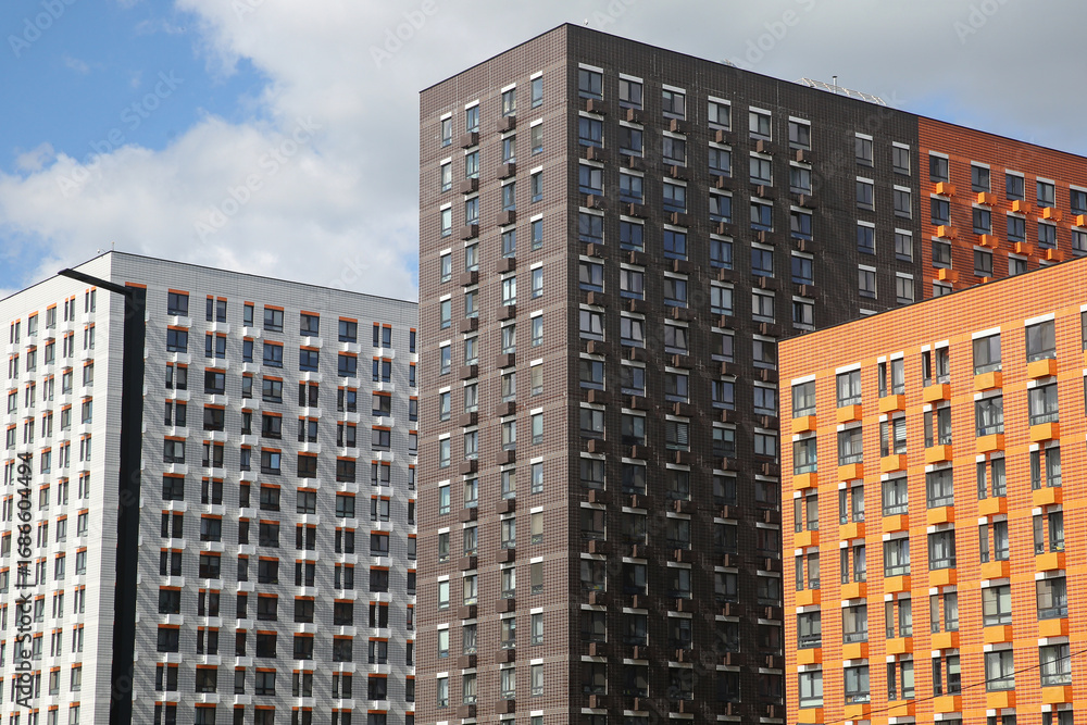 Naklejka premium Facades of houses in the new microdistrict called Buninskie Lugy (