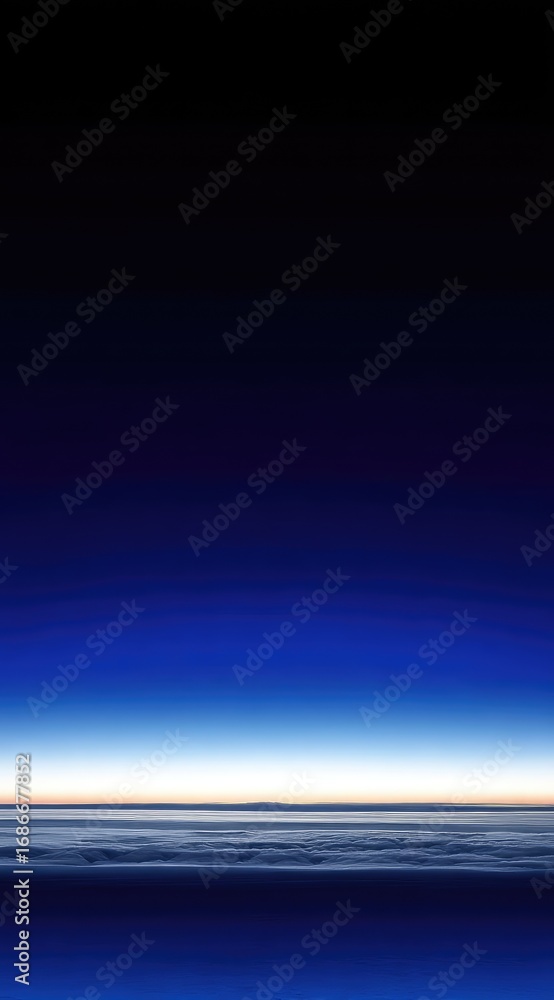 Fototapeta premium A scenic, atmospheric view of Earth's horizon from space, displaying a gradation of colors from the darkness of space to a bright horizon line