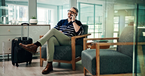 Phone call, travel and man in airport lounge for professional contact, flight schedule and luggage. Communication, layover update and business trip with mature person in vip lobby with suitcase