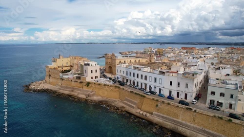Gallipoli - Italy, Apulia - spectacular parallel aerial photograph of the western shore road on the promenade