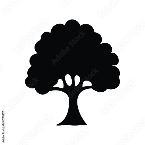 Silhouette of a lush tree with a broad crown and strong trunk