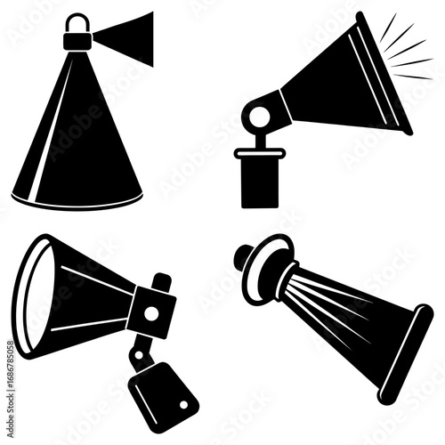 Illustration of four different black and white spotlights with varying designs and orientations shown