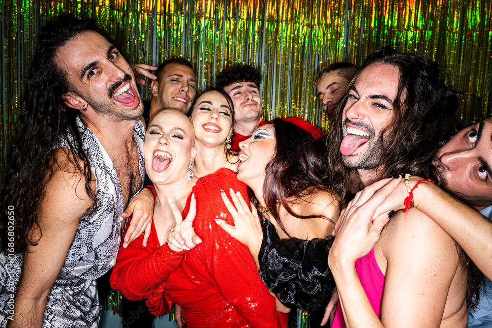 Obraz premium Friends Celebrate Pride With Playful Poses Sticking Tongues Out and Vibrant Energy at a Party