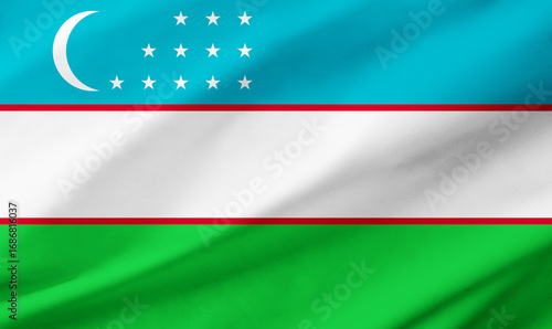 Uzbekistan flag background with waving fabric texture