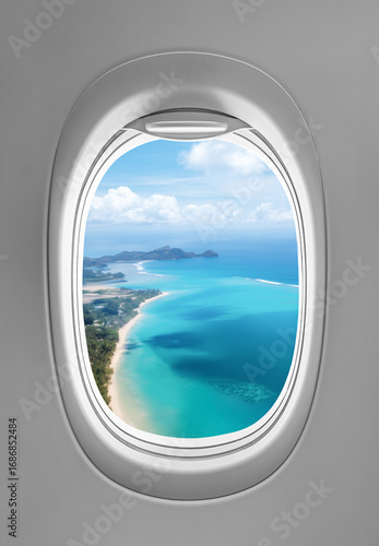 Papier peint Aerial view of a tropical beach captured from an airplane porthole, showcasing a
