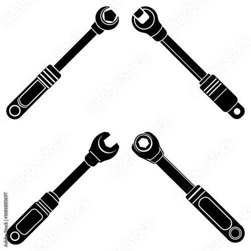 Four black and white wrenches with different head types facing different directions on a white background