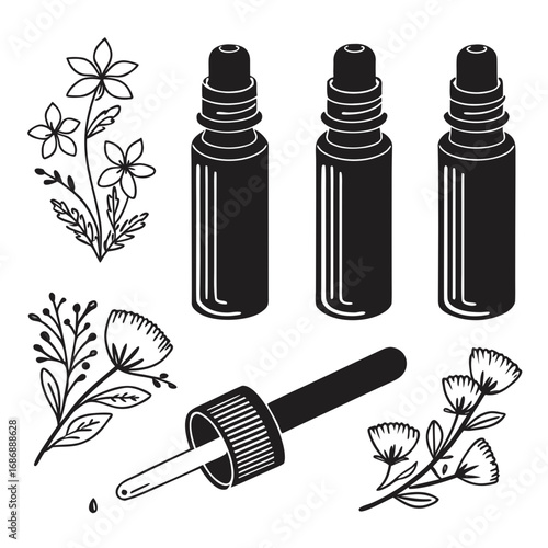 Essential oil bottles dropper and botanical elements