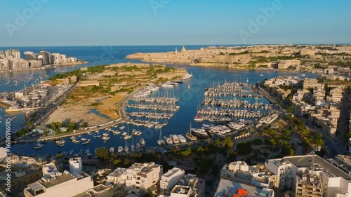 Drone sunset view of Manoel island and Valletta city. Maltese island