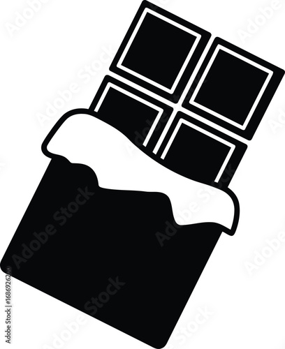 a hand holding a piece of chocolate bar