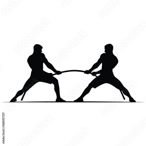 Silhouette of Men Engaged in a Tug of War Contest