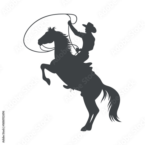 Silhouette of a Cowboy Riding a Rearing Horse with Lasso
