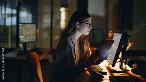 Fotografie Nighttime investor analyzing blockchain using touchscreen in workspace closeup