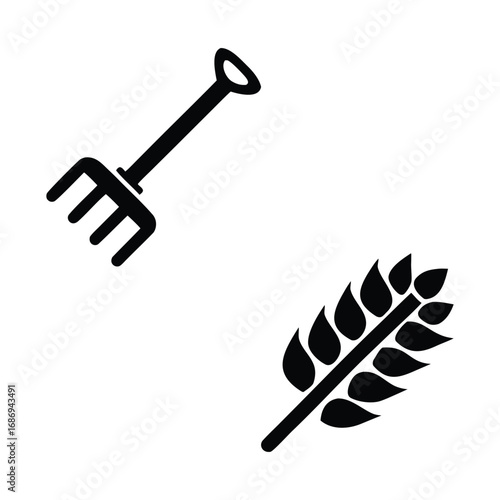 Black silhouette of a pitchfork and a wheat stalk on a white background rake tool