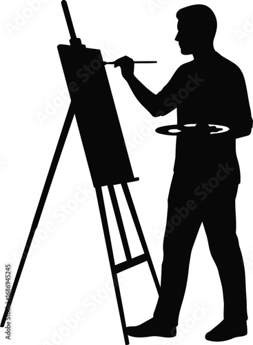 an artist silhouette painting on canvas with easel