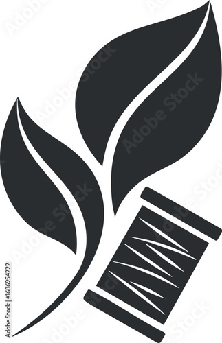 Black and white icon of a sewing thread spool with two leaves symbolizing eco-friendly textile or organic fabric craft