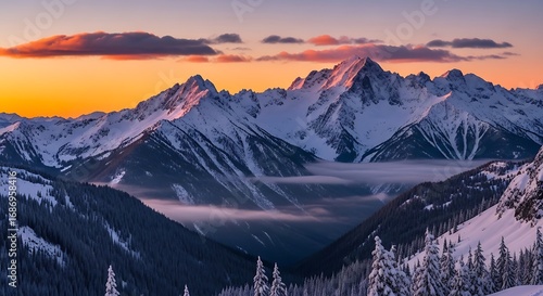 Sunset over snowy mountain range. (1)