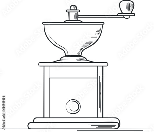 Vintage manual coffee grinder with a wooden base and metal crank handle isolated on white background