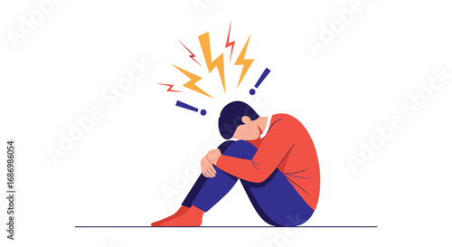 Man sitting in distress with his head in his hands symbolizing stress and anxiety