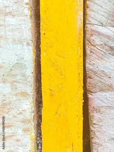 yellow paint on wood