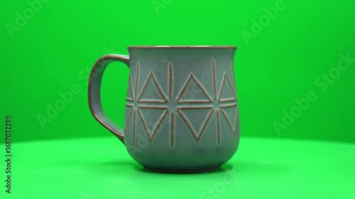 Light gray mug on green screen