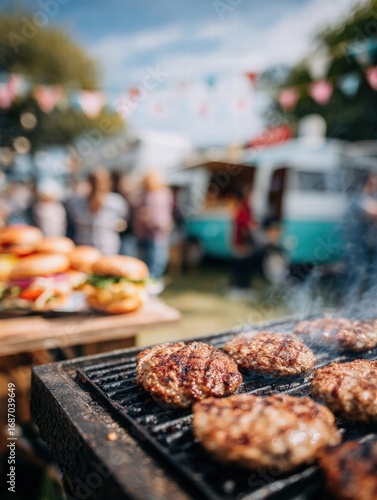Delicious Outdoor Barbecue with Juicy Burgers and Festive Atmosphere