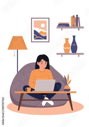Woman working on laptop in cozy living room bean bag chair
