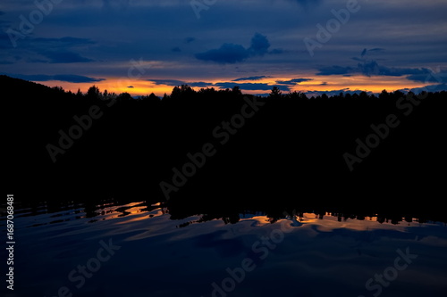 Wallpaper Mural Sunset over a forest lake. Torontodigital.ca