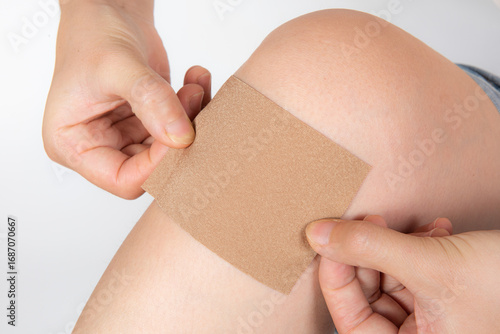 Herbal Medical Pain Relief plaster on knee, traditional Chinese medicine
