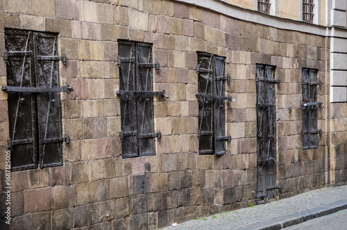 Photography Historic Stone Wall with Iron-Barred Windows in Stockholm