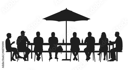 people sitting at outdoor table under umbrella silhouette