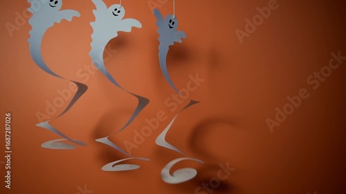 Three funny cartoon paper spiral ghosts