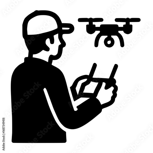 Pilot operates drone with remote control for aerial shots