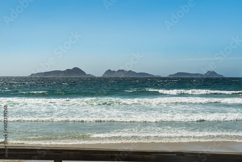 Vigo beach, Spain, with the Cies Islands visible in the background from the Spanish peninsula. A beautiful view of the mainland and the islands.