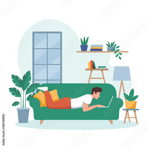 Man working on laptop while lying on sofa
