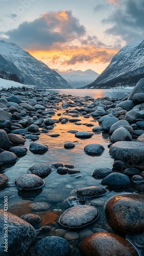 Sunset over Glacial Lake and Rocks