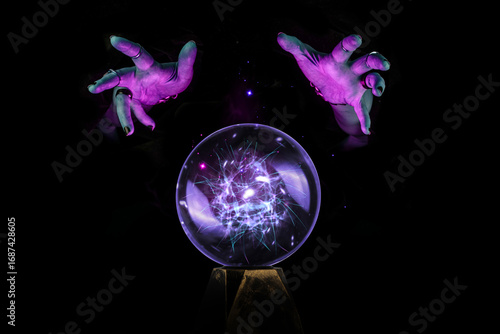 Fotografie Fortune teller hands casting a spell over a crystal ball for divination, foresig