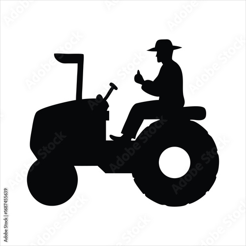 Farmer in a hat driving a tractor and giving a thumbs up