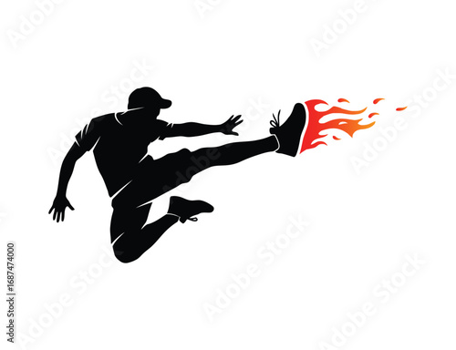 Silhouette of a man kicking with fire