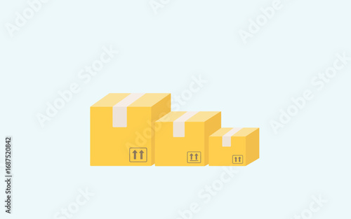 Three stacked yellow shipping boxes of varying sizes on a light blue background