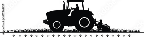 a farmer operating tractor in field silhouette