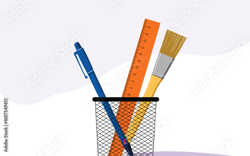 Blue pen and orange and yellow rulers in a black mesh cup