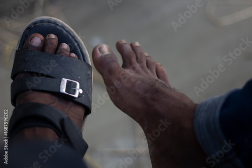 Close up of a persons foot wearing a sandal