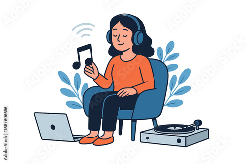 A young woman sits in a chair, surrounded by technology, as she listens to music on wireless headphones connected to a laptop